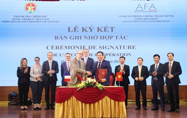 Việt Nam - Pháp ký nâng cấp Bản Ghi nhớ hợp tác về phòng, chống tham nhũng. Ảnh: TH